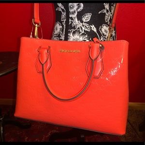 Michael Kors medium size purse in coral color